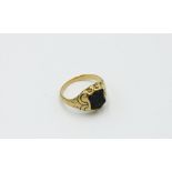 A 19th century high purity gold signet ring with a shield shaped bloodstone intaglio with a