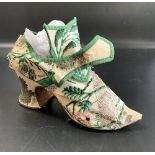 Early 18th century shoes. Brocade floral silk with silver threads and edged with green.