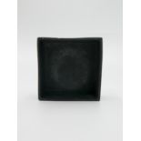 A rare Troika black clay squared dish, chips, 11.5 x 11.5cm, height 4cm.