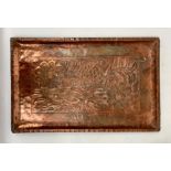 A Keswick style Arts and Crafts copper tray, with flower and foliate repousse decoration, 24.