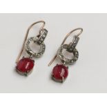 A pair of good early 20th century diamond and ruby earrings,