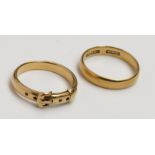 A high purity gold buckle ring, tests as 18ct together with a plain 18ct gold band, 10.5g.