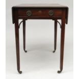 A mahogany Pembroke table, early 19th century, with a single frieze drawer on square chamfered legs,