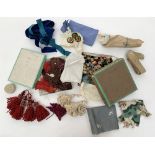 A quantity of unused braiding, decorative tapes, tassels, fringing, trimmings, wools.