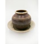 A Niek Hoogland slipware studio pottery bowl, signed to base, diameter 27cm,