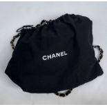 A Chanel black satin quilted evening bag,
