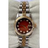 A ladies Rolex, 18ct gold and stainless steel,