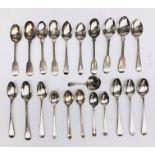 A George III plain silver caddy spoon, together with various silver tea and coffee spoons,