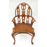 A Gothic style yew wood Windsor armchair, 20th century,