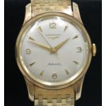 A gentleman's Longines automatic wristwatch in 9ct gold case on 9ct gold bracelet the 19 jewel 22