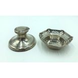 A pierced silver bon bon dish together with a reeded filled silver capstan inkwell.