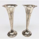 A pair of James Deakin & Sons silver spill vases with filled silver bases, Sheffield 1916,