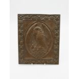 A copper fronted bronze plaque of an eagle feeding chicks, height 30cm,