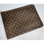 A Louis Vuitton monogram wallet, leather lined interior and branded fabric storage bag, height 28.