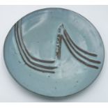 A Janet Leach studio pottery shallow dish, the turquoise slip with simple incised decoration,