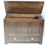 An oak mule chest, late 17th/early 18th century, the triple panelled front above two drawers,