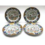 A set of four Spode stone china plates, early 19th century, chinoiserie design, diameter 24cm.