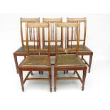 A set of five inlaid mahogany dining chairs, each with a pierced vertical splat, drop in seat,