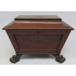 A Regency mahogany sarcophagus wine cooler with carved paw feet, width 74cm.