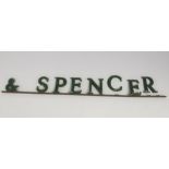 A Marks & Spencer green painted part metal sign, length 147.5cm.