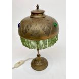 A brass table lamp and shade, height 35cm.
