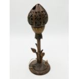 A pair of Eastern carved hardwood table lamps,