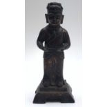 A Chinese cast iron figure of a man, height 32cm.