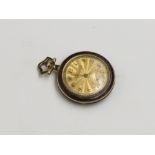 A mauve enamelled small gold keyless open face fob watch, the gold dial signed Spaulding & Co,