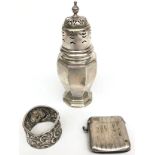 A pierced silver, urn form sugar dredger, height 16.