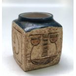 A Troika cube jar with rounded shoulder decorated by Simone Kilburn, height 9 cm.