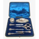 A silver mounted manicure set by Synyer & Beddoes, Birmingham 1900, cased.