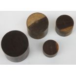 A nest of five graduated lidded Treen boxes,