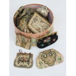 Miscellaneous purses and evening bags, including a silver plated purse and a beadwork purse.