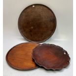 A George III mahogany circular tray, with chevron banded moulded edge, diameter 48cm,