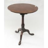 A George III mahogany tripod table,