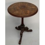 An unusual Victorian walnut tripod table,