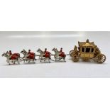 A large English diecast model of the coronation coach, 1953, drawn by a team of eight horses,