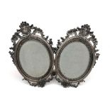 A good ornate Italian silver double photograph frame by Mario Buccellati with scrolling floral and