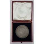 A silver 1897 Jubilee medal by Brock, 55 mm, red leather case.