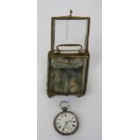 A gilt metal and bevelled glass slope front pocket watch case and a silver cased open face pocket