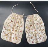 A pair of 18th century linen pockets on a linen waistband tape,