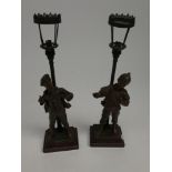 A pair of French spelter table lamps, early 20th century, after Bouret,