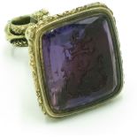 A good 19th century high purity gold ornate seal with intaglio carved amethyst, 22.3g.