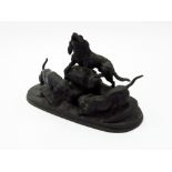 A Jules Moigniez bronze group, late 19th century, of three hunting dogs on rockwork on oval base,