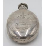 An oval silver hip flask with pull off cup base by Thomas Smily, London 1874, length 13.5cm.