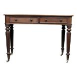 A Victorian mahogany side table, with two frieze drawers on turned and fluted tapering legs,