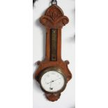 A Late Victorian walnut wall barometer, length 48cm.