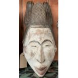 An African wooden Idoma tribal mask, Nigeria, height 37cm width 16cm.