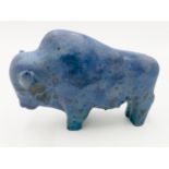 A West German Ruscha pottery fat lava figure of a bison, in mottled blue glazes,