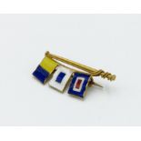A 15ct gold brooch by Pegler of Southampton with three enamelled pennants.